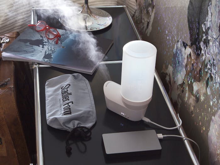 Emma personal humidifier by Stadler Form in white in a hotel room
