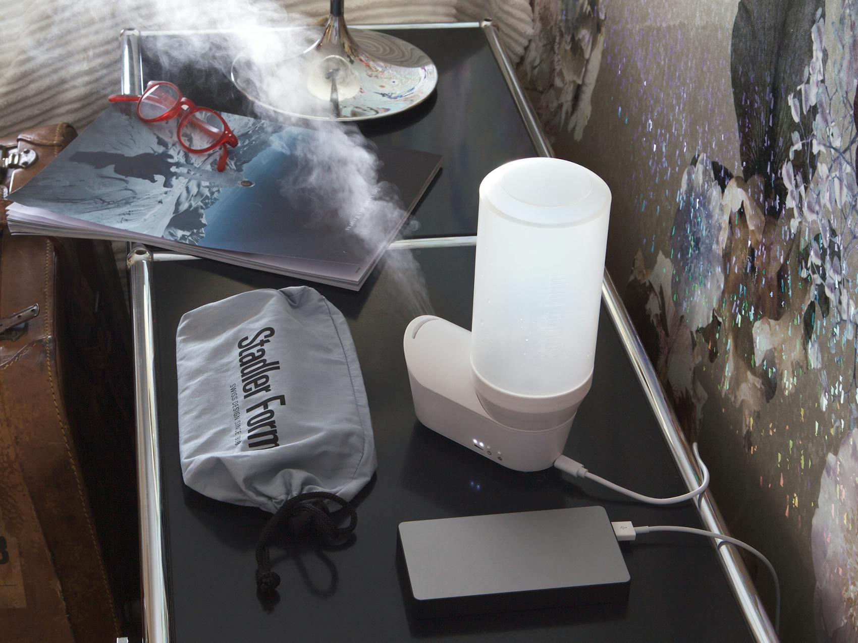 Emma personal humidifier by Stadler Form in white Emma personal humidifier by Stadler Form in white in a hotel room
