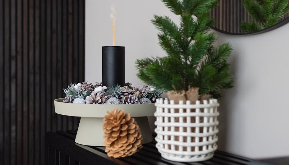 Aroma Diffuser Lucy black from Stadler Form as a christmas decoration on a side board