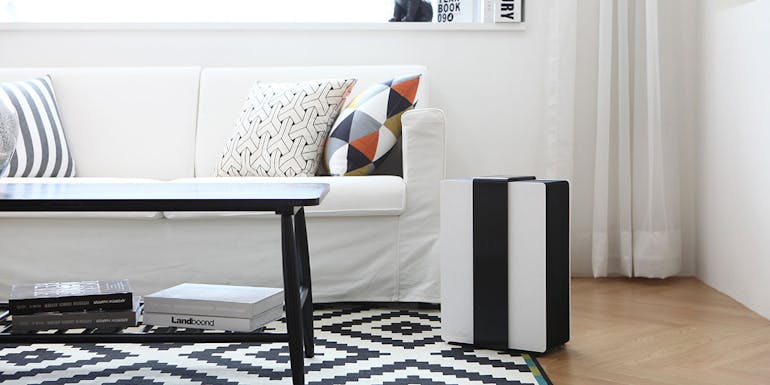 Robert air washer by Stadler Form in black and white Robert air washer by Stadler Form next to a sofa