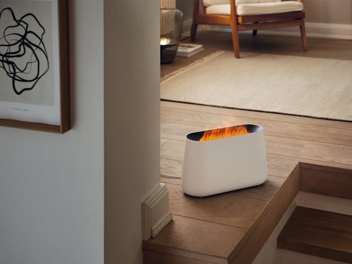 Ben humidifier by Stadler Form in white on the floor in the living room