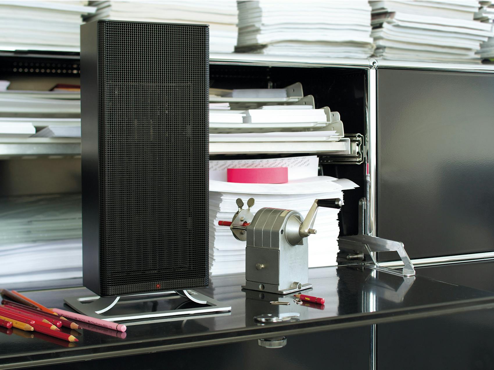 Anna heater by Stadler Form in black Anna heater by Stadler Form in black on the desk in an office