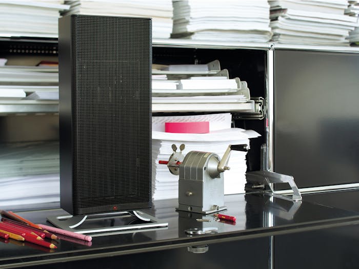 Anna heater by Stadler Form in black Anna heater by Stadler Form in black on the desk in an office