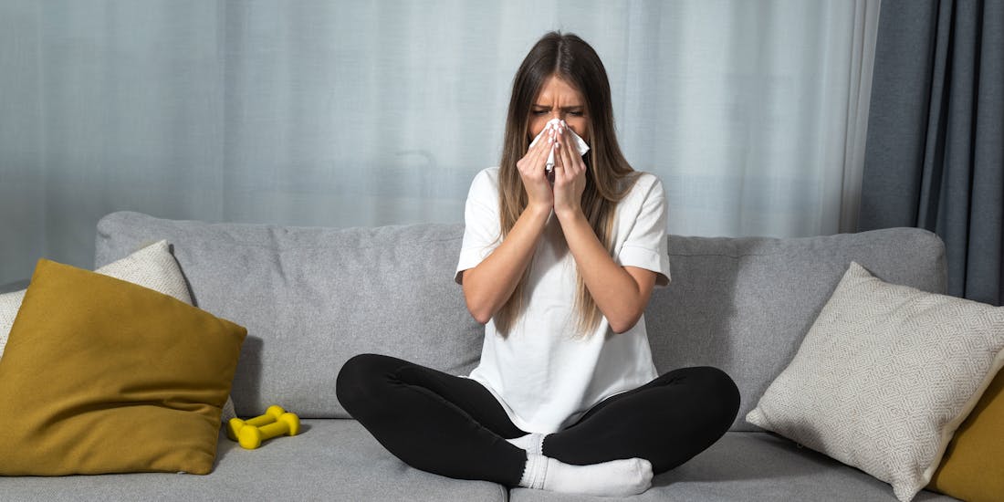 Woman at home with allergy