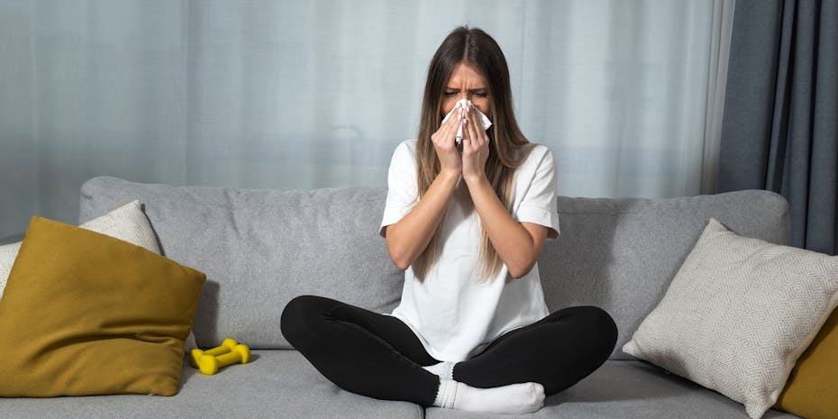 Woman at home with allergy