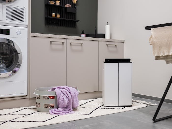 Dehumidifier Lukas in a modern laundry room landscape Dehumidifier Lukas in a modern laundry room landscape