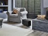 Oskar big humidifier by Stadler Form in black Oskar big humidifier by Stadler Form in black in living room with a fireplace