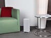 Anna heater by Stadler Form in white in a living room