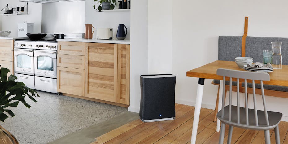 Roger air purifier by Stadler Form in a kitchen area Air purifier Roger by Stadler Form between a kitchen and a dining area