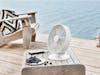 Tim table fan by Stadler Form in white in an outdoor lounch