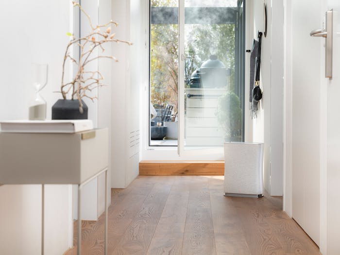 Roger little air purifier by Stadler Form in white Roger little air purifier by Stadler Form in white in a hallway