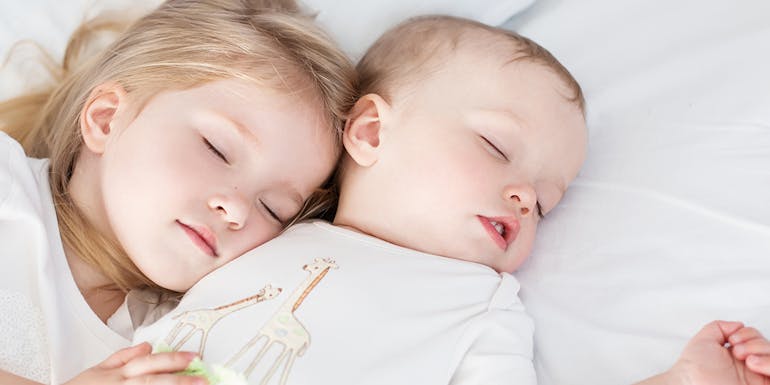 Two children sleeping peacefully Two children sleeping peacefully