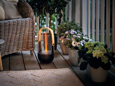 Sophie aroma diffuser and lantern from Stadler Form outside on a balcony