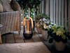Aroma diffuser Sophie from Stadler Form on a balcony Sophie aroma diffuser and lantern from Stadler Form outside on a balcony