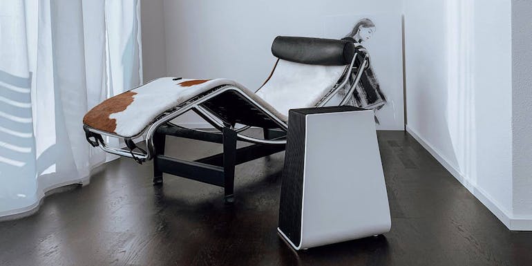 George Luftwäscher von Stadler Form neben einem modernen Longchair George Luftwäscher von Stadler Form neben einem modernen Liegestuhl