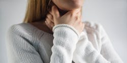 Woman with a sore throat