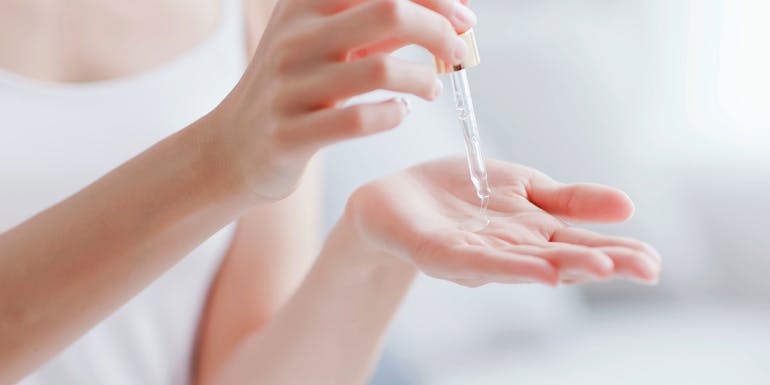 Woman with serum Woman with serum