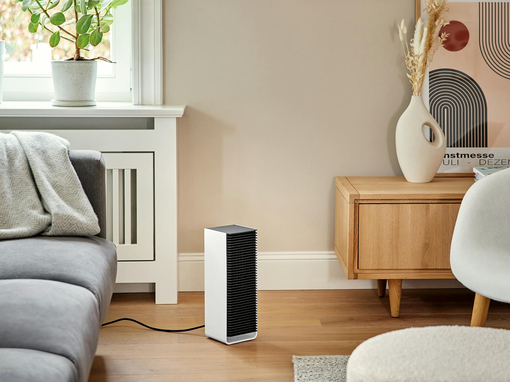 Heater Sam little from Stadler Form in a living room Sam little heater from Stadler Form in a living room