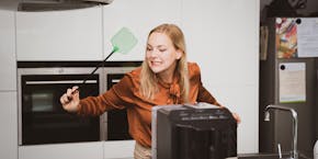 women catches insect
