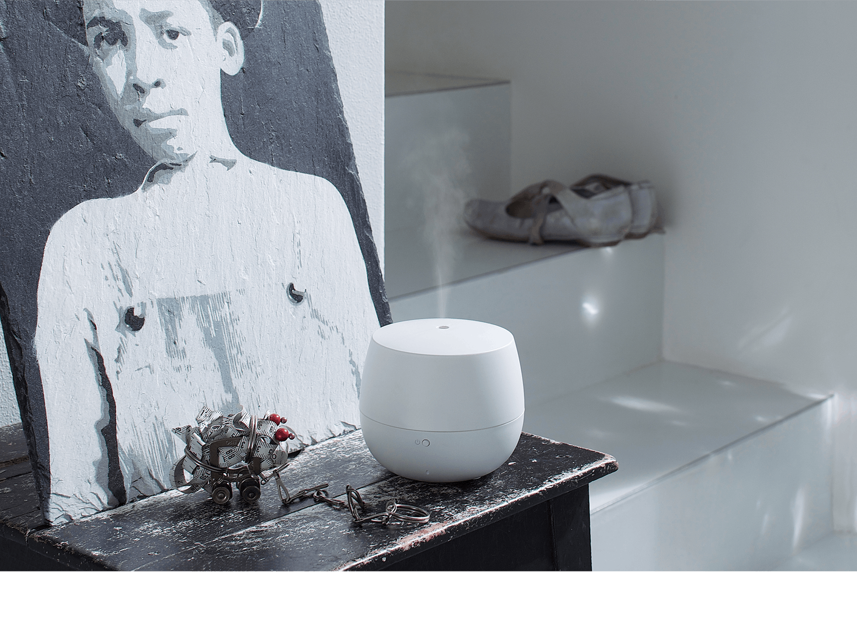 Mia aroma diffuser by Stadler Form in white Mia aroma diffuser by Stadler Form in white on a sideboard