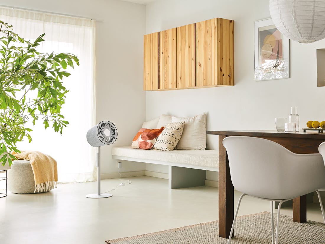 Simon fan by Stadler Form in white in a bright dining room area