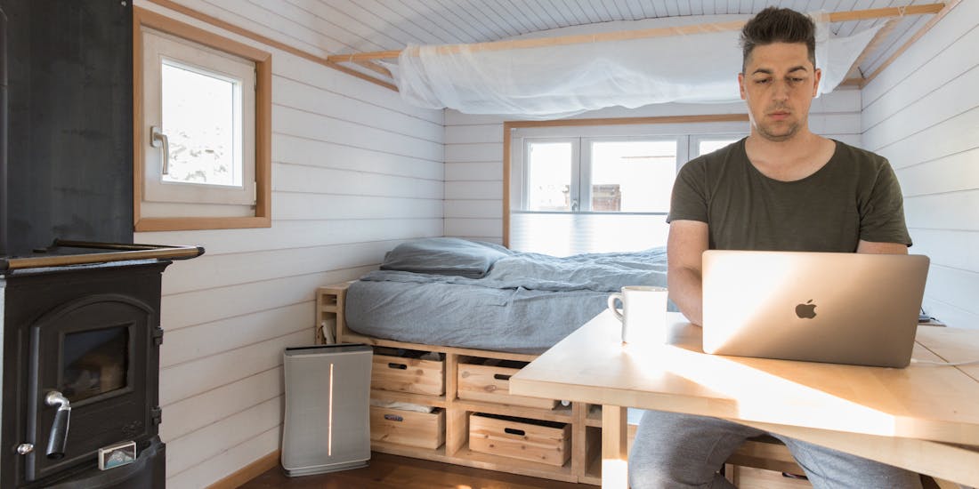 Kevin Rechsteiner in his tiny house with Roger little air purifier by Stadler Form