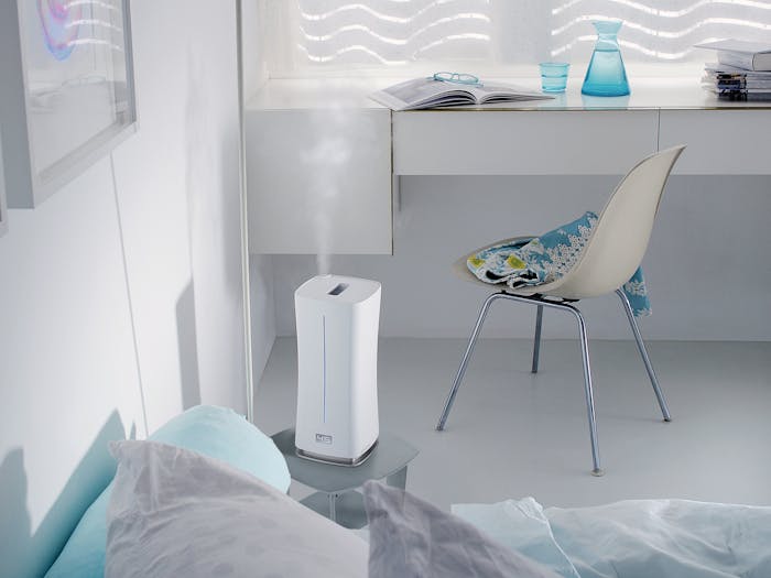 Eva little humidifier by Stadler Form in white in a bedroom