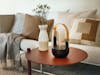 Sophie mini aroma diffuser on a side table
