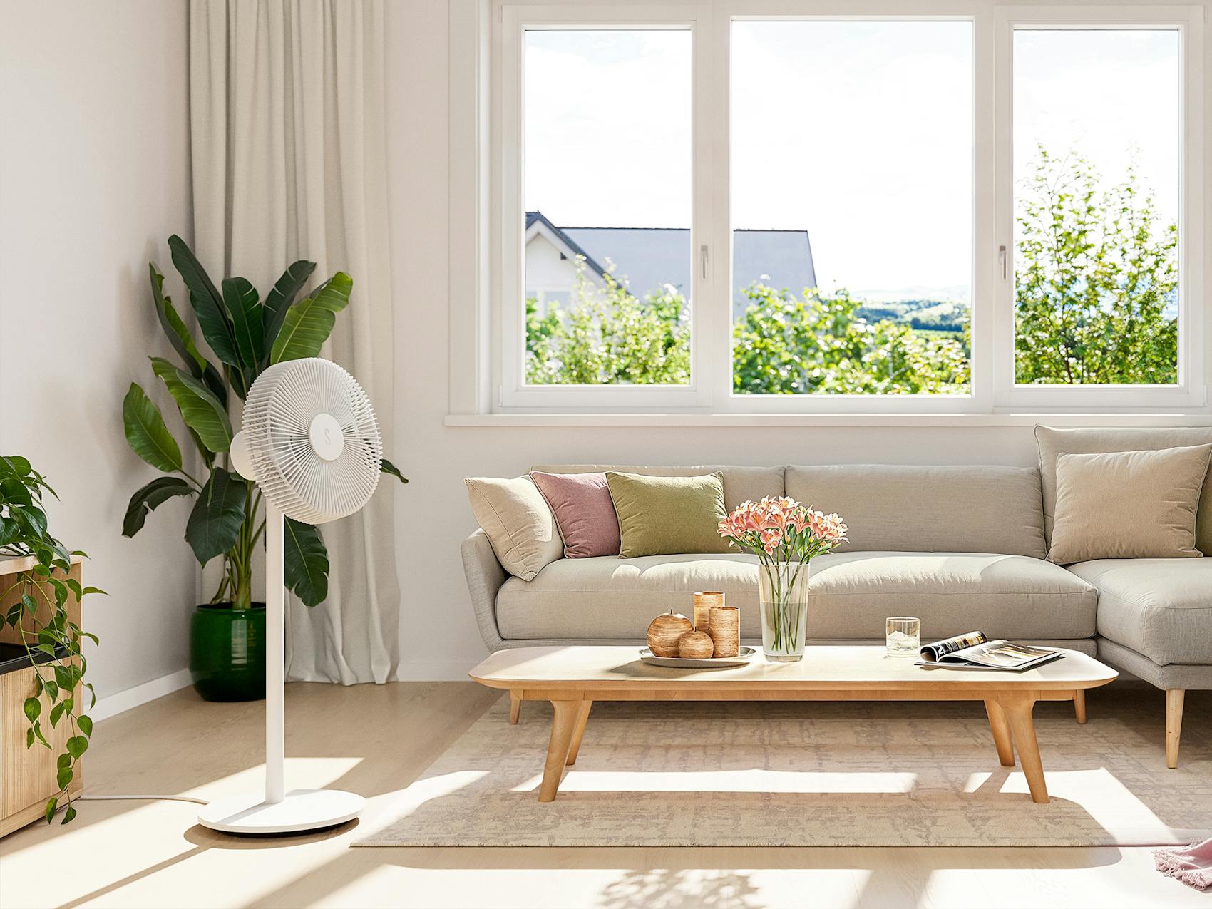 Finn fan by Stadler Form in a modern living room with summery flair
