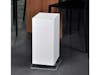Viktor air purifier by Stadler Form in white next to a dining table