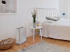 Roger little air purifier by Stadler Form in white Roger little air purifier by Stadler Form in white in a bedroom