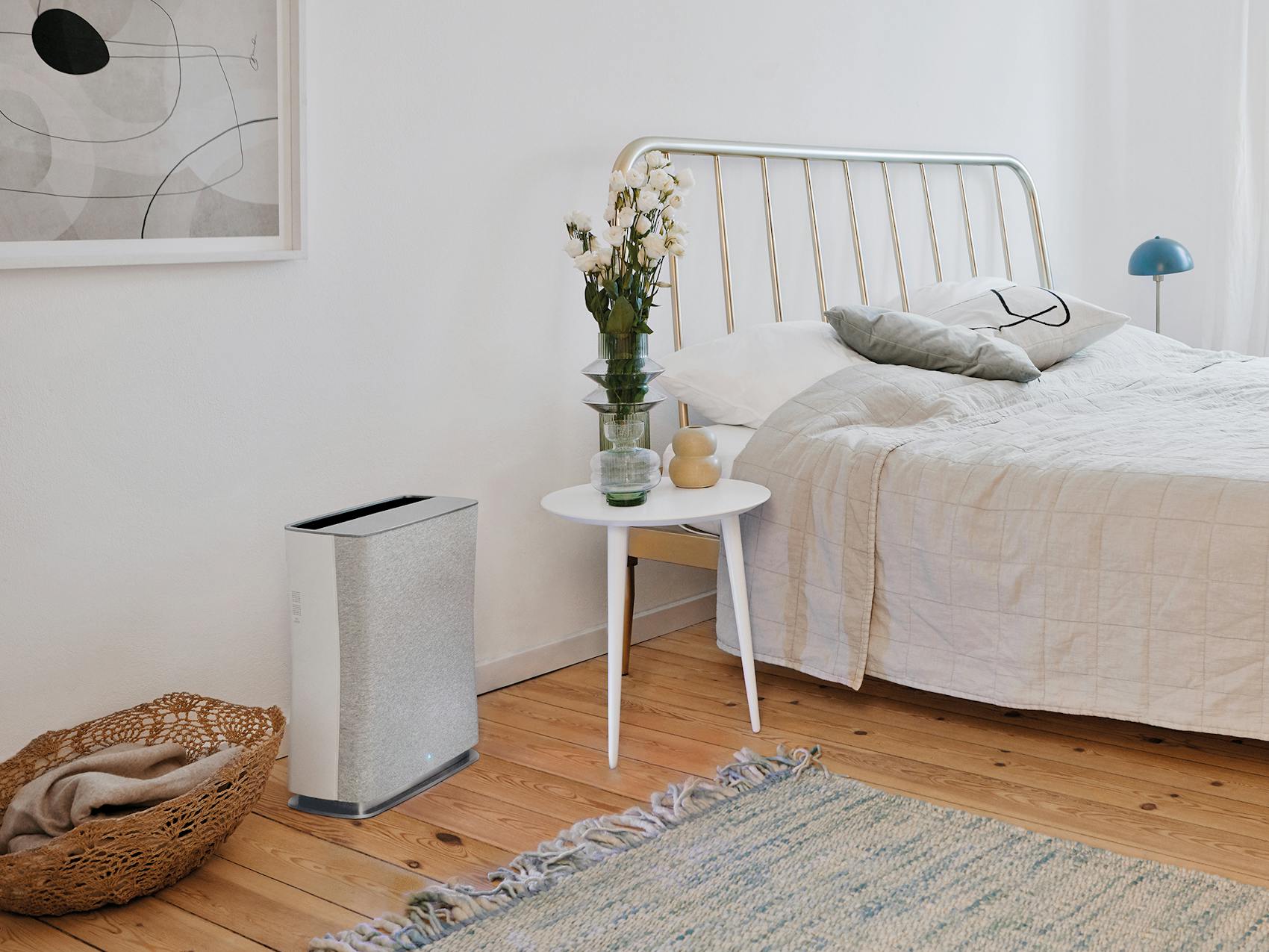 Roger little air purifier by Stadler Form in white Roger little air purifier by Stadler Form in white in a bedroom