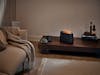 Ben humidifier by Stadler Form in black Ben humidifier by Stadler Form in black on a side table in a living room