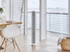 Peter tower fan by Stadler Form in white Peter tower fan by Stadler Form in white in a bright dining room