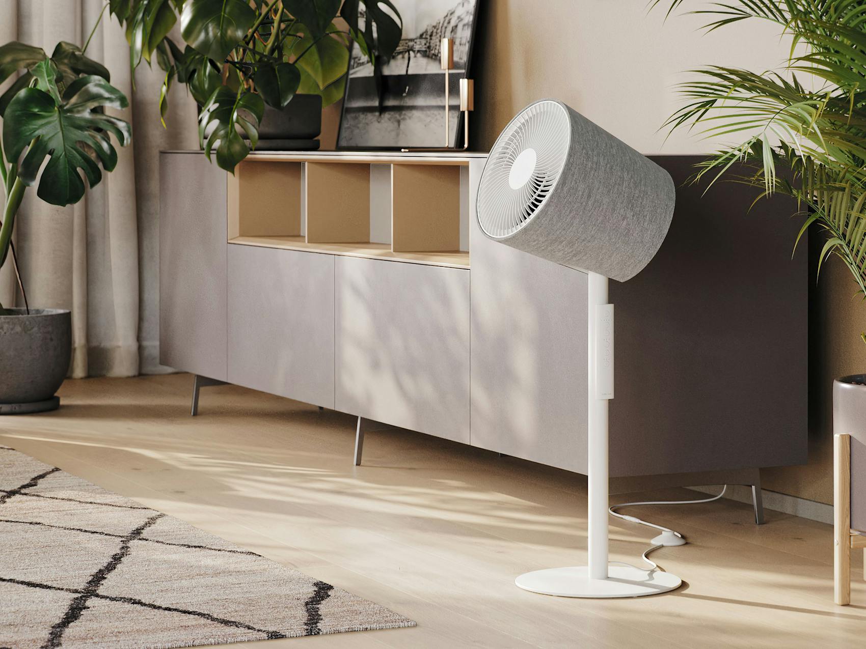 Simon fan by Stadler Form in white in a living room with plants