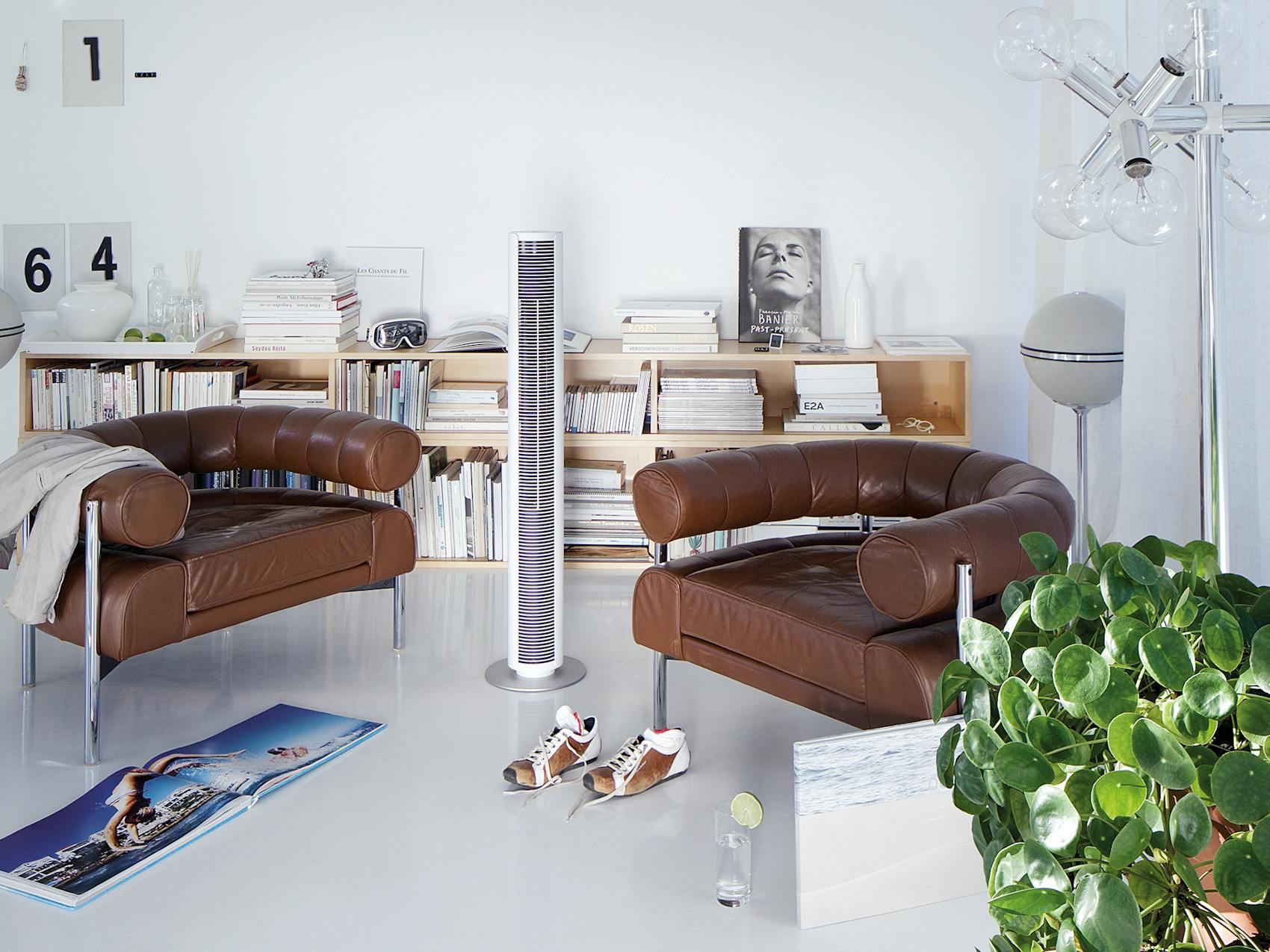 Peter tower fan by Stadler Form in white in a living room