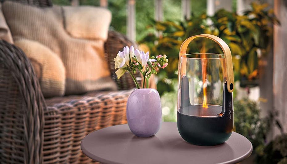 Sophie little aroma diffuser and lantern from Stadler Form outside on a balcony 
