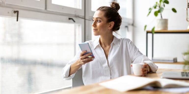 Woman distracted at home office Woman distracted at home office