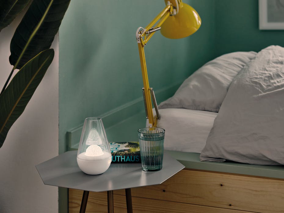 Nina aroma diffuser by Stadler Form Nina aroma diffuser by Stadler Form with fragrance globe Amber White in a bedroom
