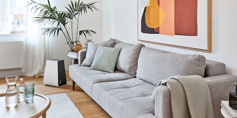Air washer George from Stadler Form in a living room