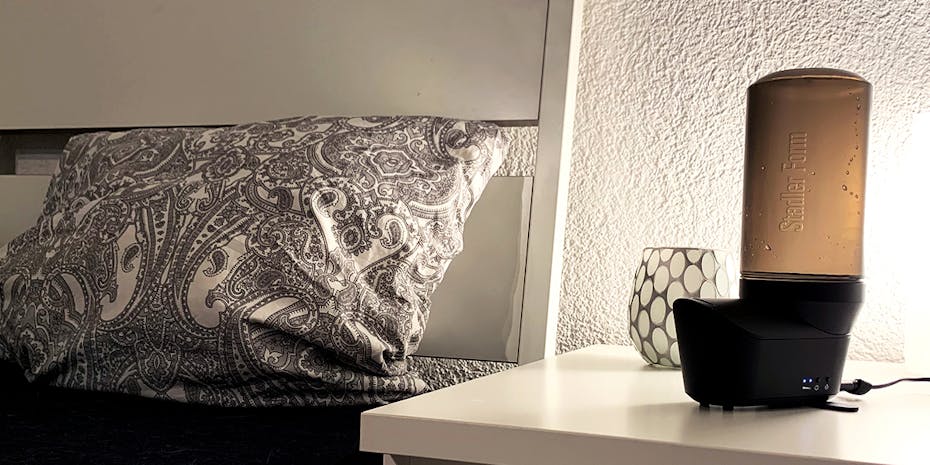 Emma humidifier by Stadler Form in black on a bedside table Emma humidifier by Stadler Form in black on a bedside table