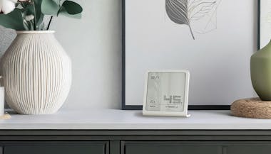 Stadler Form Selina white on a sideboard in a bright environment Stadler Form Selina white on a sideboard in a bright environment