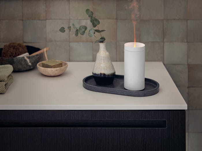 Lucy aroma diffuser by Stadler Form in white Lucy aroma diffuser by Stadler Form in white in a bathroom