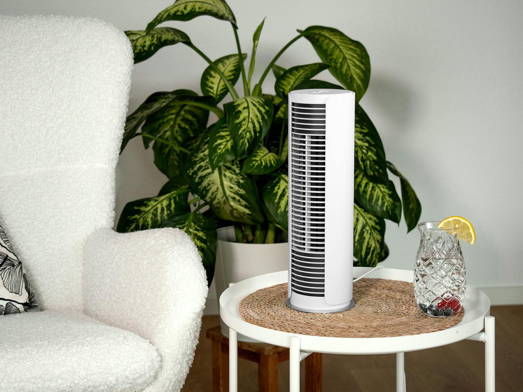 Peter little table fan from Stadler Form on a side table