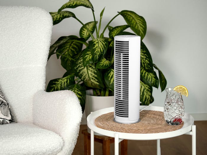 Peter little table fan from Stadler Form on a side table