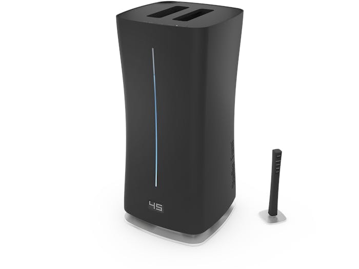 Eva humidifier by Stadler Form in black as perspective view including remote controlle