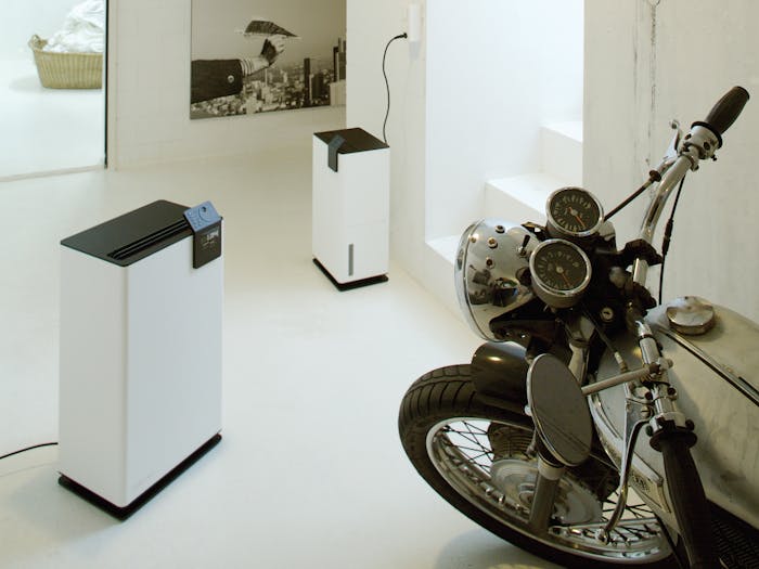 Albert and Albert Little dehumidifiers by Stadler Form Albert and Albert little by Stadler Form in a motorcycle garage