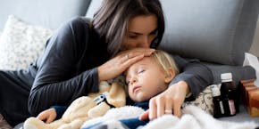Mother with sick child Mother with sick child