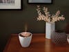 Zoe aroma diffuser by Stadler Form in white as decoration on a sideboard
