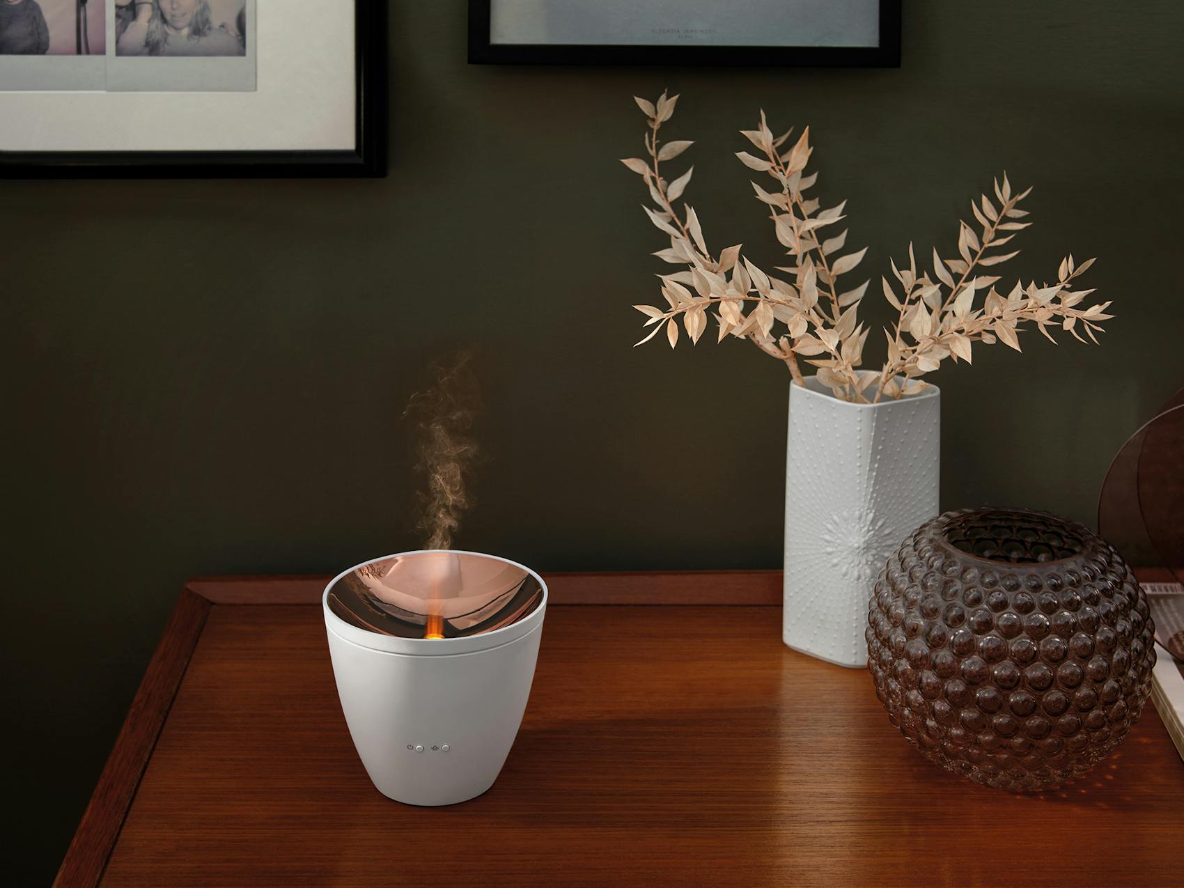 Zoe aroma diffuser by Stadler Form in white as decoration on a sideboard